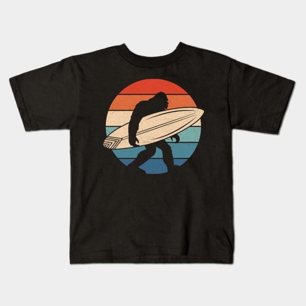 Surfing Bigfoot Sunset Kids T-Shirt by Tesszero